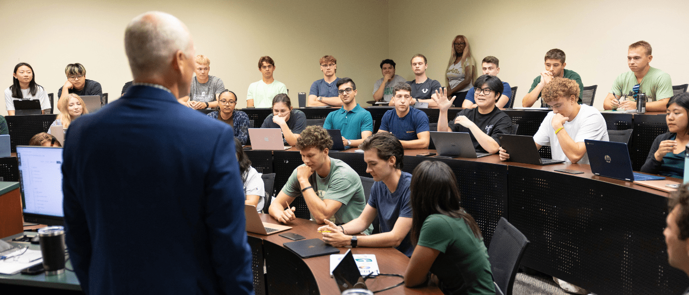 faculty teaching a classroom full of students